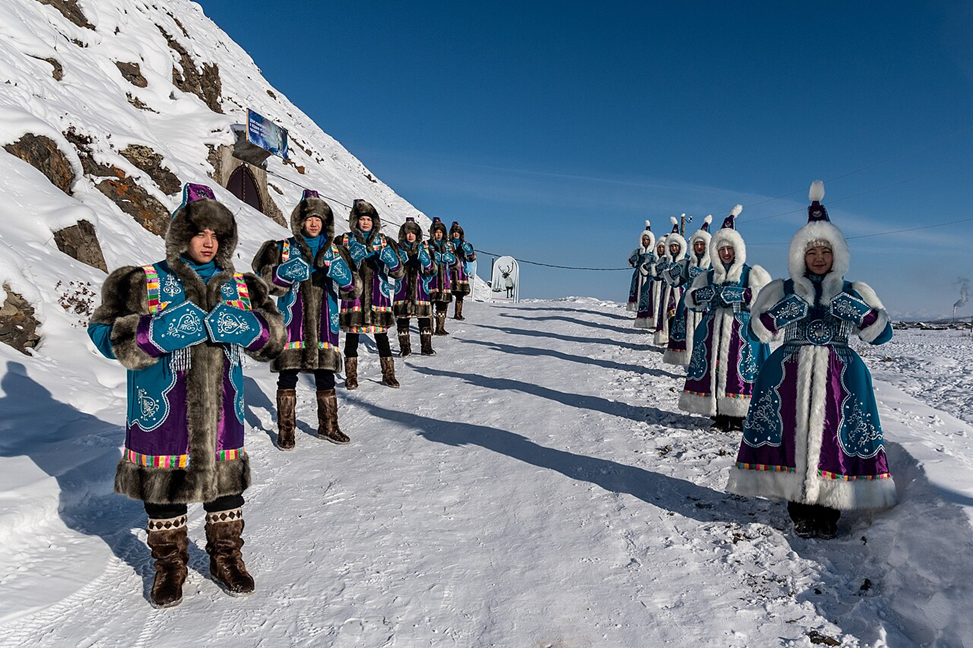 Local men and women in Oymyakon, in traditional outfits